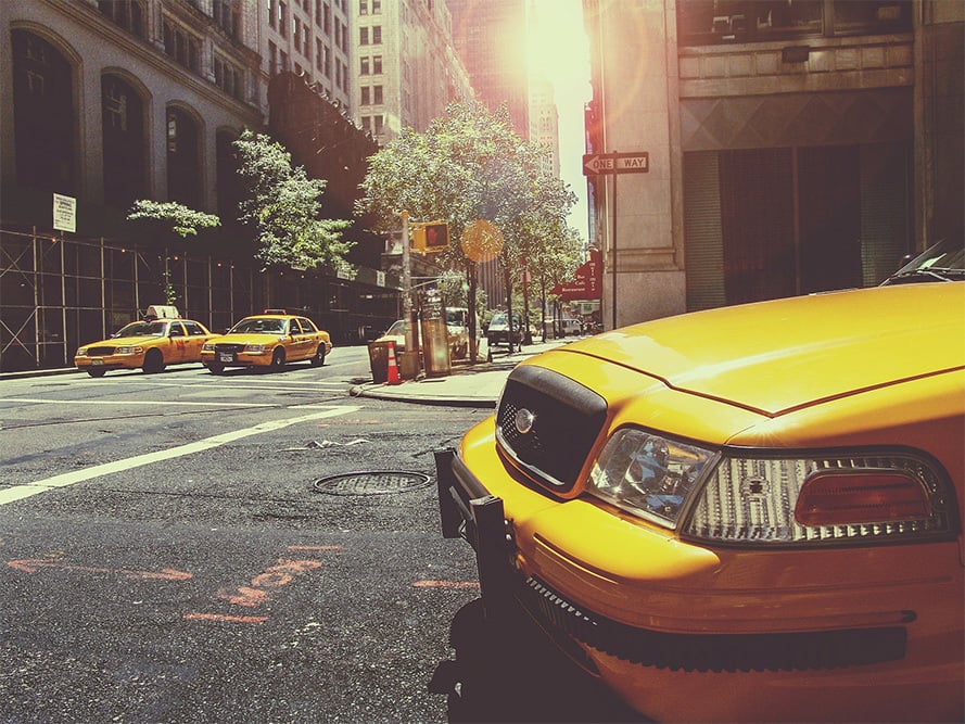 yellow cab on the road